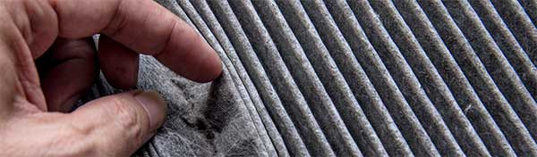 Close up of a dirty furnace filter