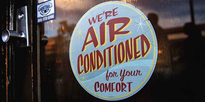 Air conditioning sign on a door